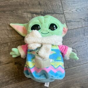 Green Plush Toy with Colorful Outfit